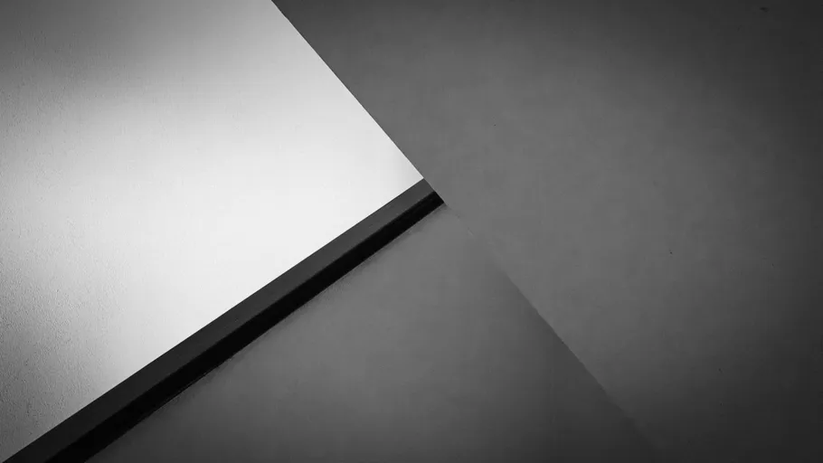 Abstract geometric shapes, black and white tones.