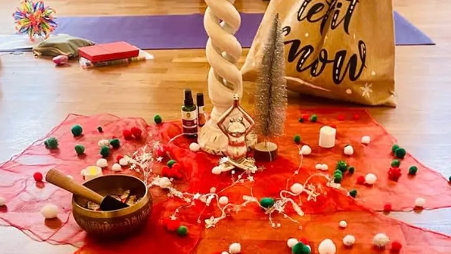 Decorative display with festive items on floor.
