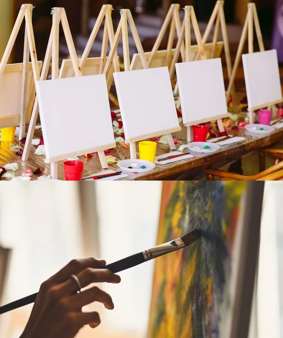 Canvas setups and painting hand in studio.