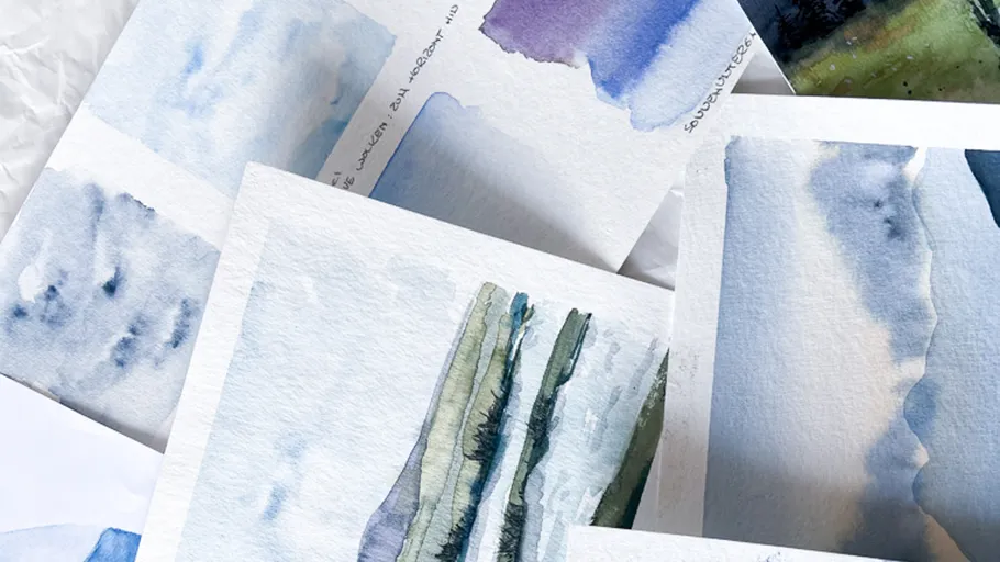 Mehrere Aquarelle auf Papier gelegt.