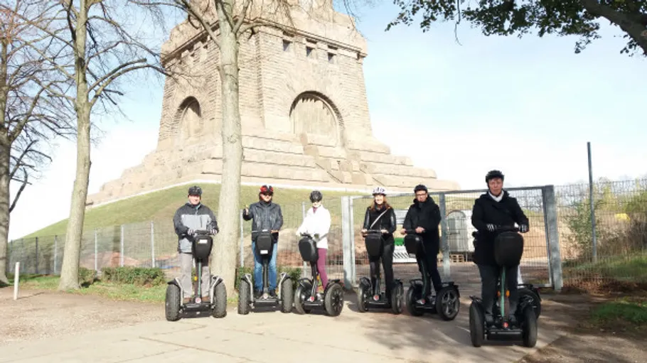 Group on Segways near historical monument.