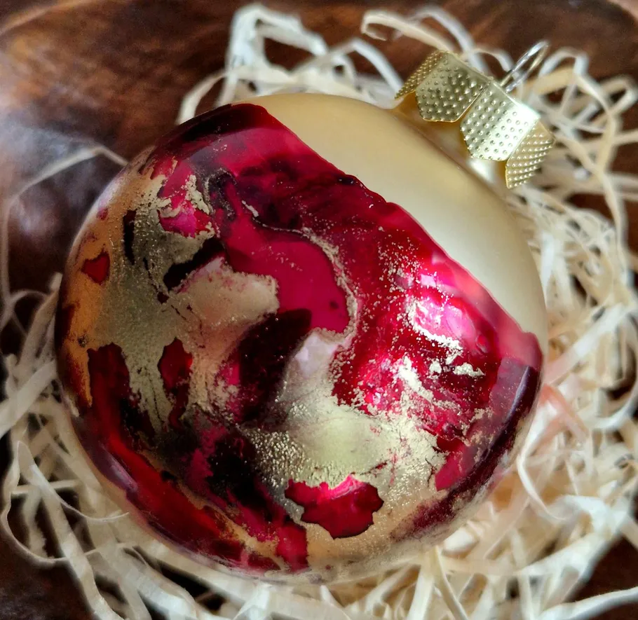 Colorful Christmas ornament in shredded paper.