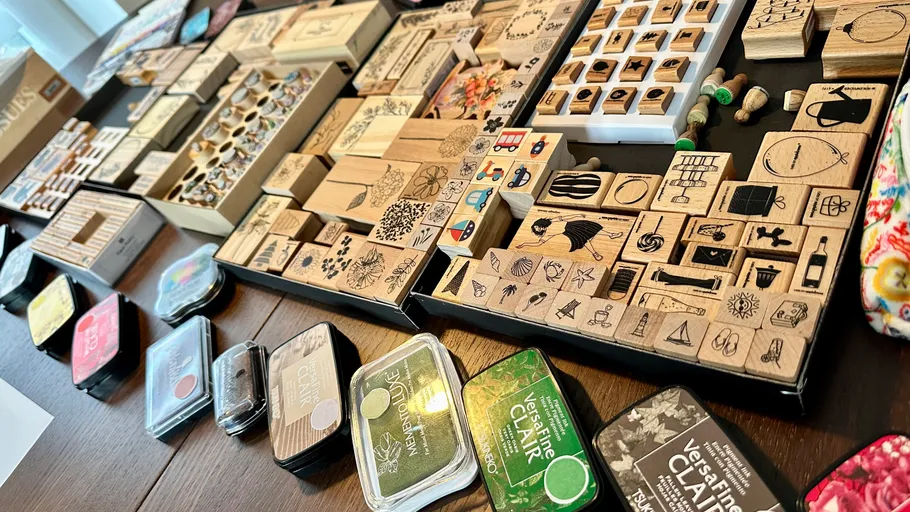 Wooden stamps displayed on a table.
