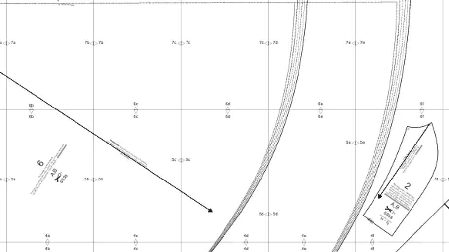Sewing pattern on gridded paper.