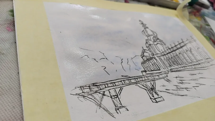 Ink drawing of a bridge and building.