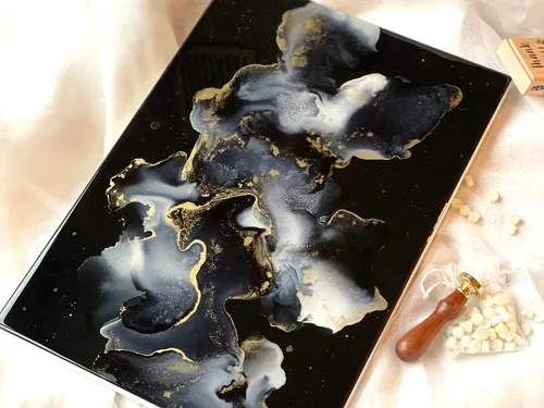 Colourful abstract surface with gold and white patterns