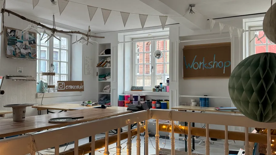 Creative workshop space with tools and supplies.