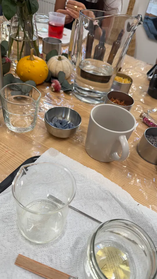 Table with crafting tools and ingredients setup.