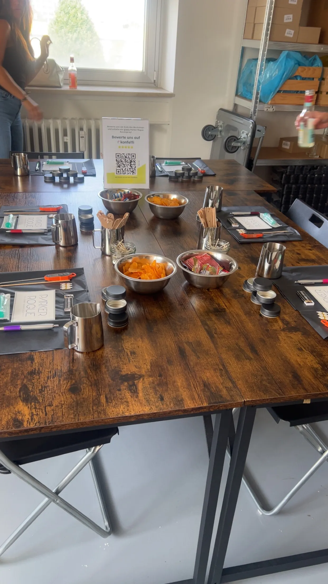 Table set with snacks and workshop materials.
