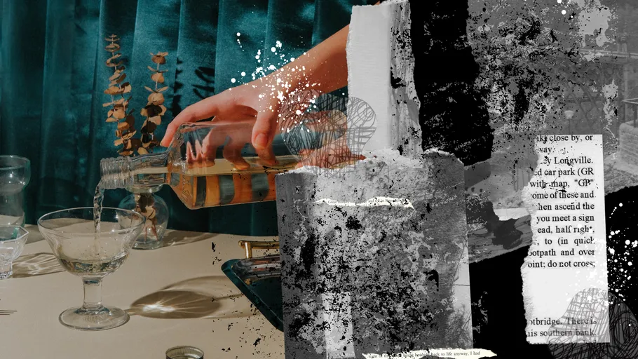 Hand pouring liquid from bottle onto table.