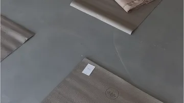 Yoga mats on a studio floor.