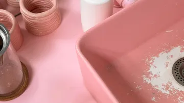 Pink ceramics on a pink countertop.