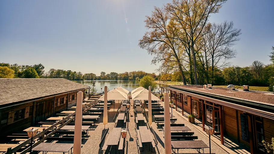 Outdoor dining area with lake view.