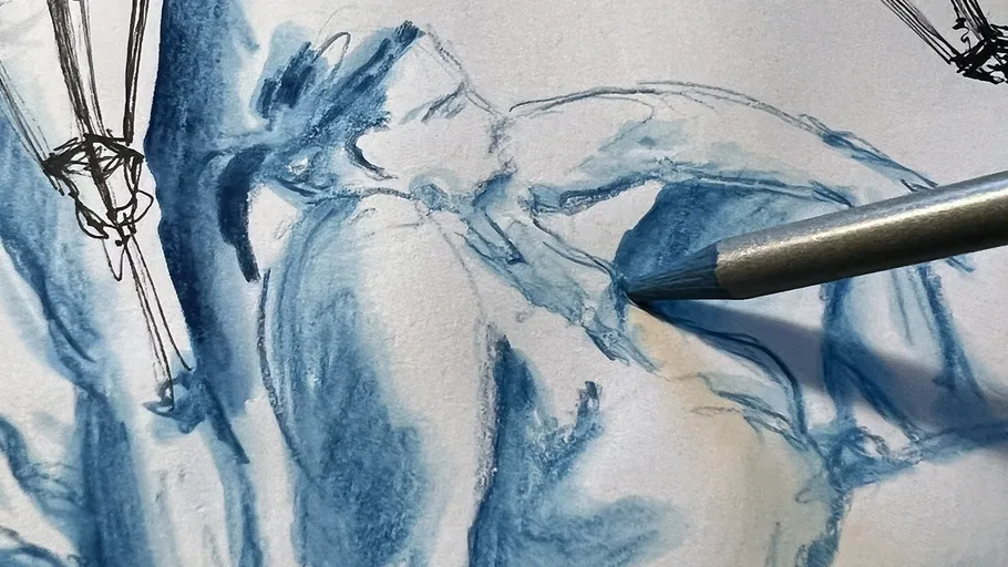 Blue sketch of figure with pencil drawing.
