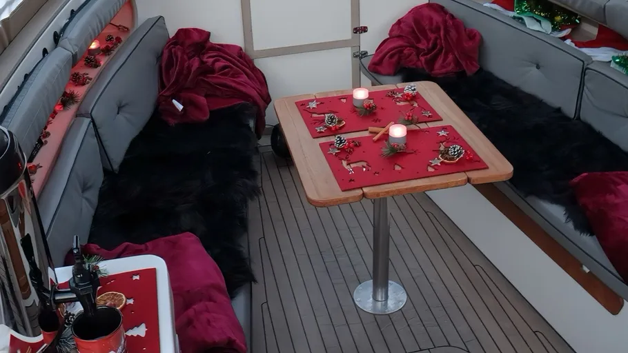 Boat interior with Christmas decorations.