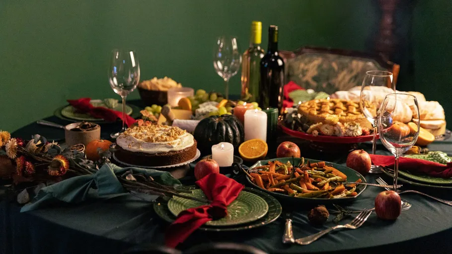Festive dinner table with various dishes.