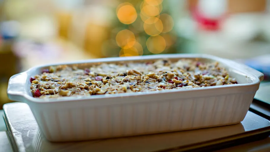 Baked dish with nuts in a white pan.