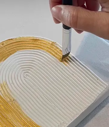 Hand bemalt goldene Textur auf Leinwand.