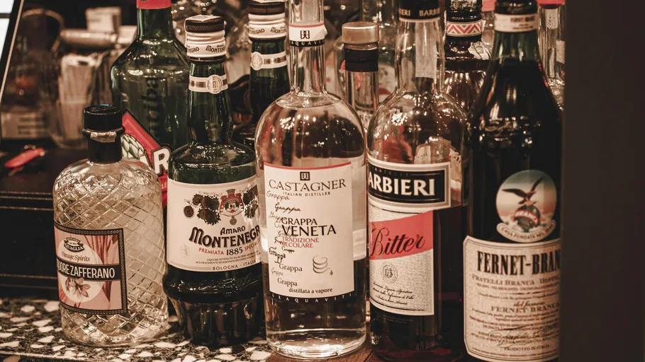 Various liquor bottles displayed on a counter.