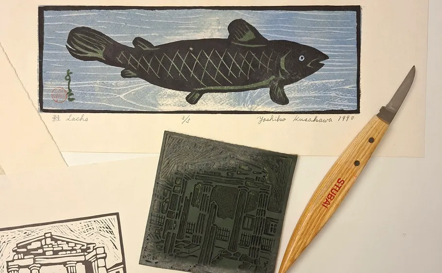 Fish print, carving tool, and block.