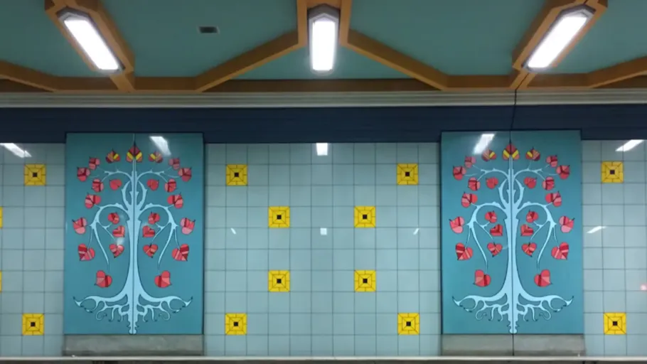 Subway wall with floral tile designs.