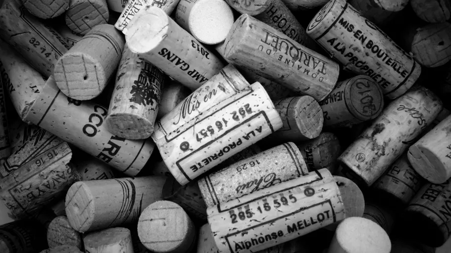 Collection of wine corks in various orientations.