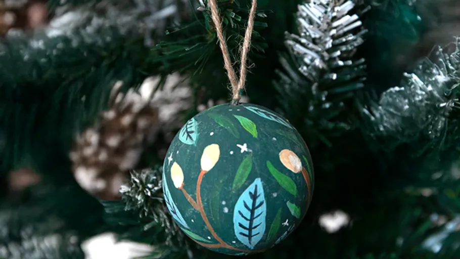 Decorative ornament hanging on Christmas tree.