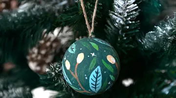 Decorative ornament hanging on Christmas tree.