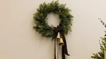 Wreath with bells on a wall.