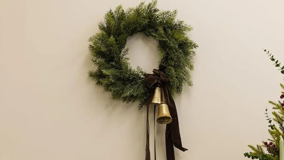 Wreath with bells on a wall.