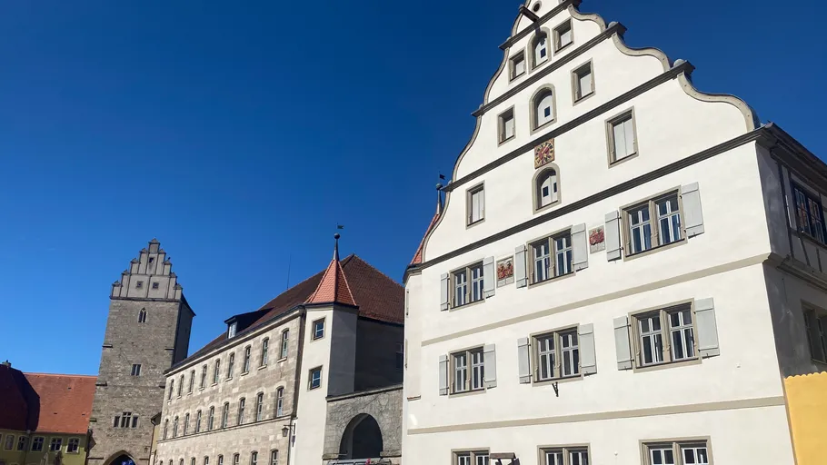 Historic buildings under a clear blue sky.