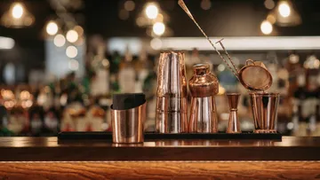 Barware tools displayed on a countertop.
