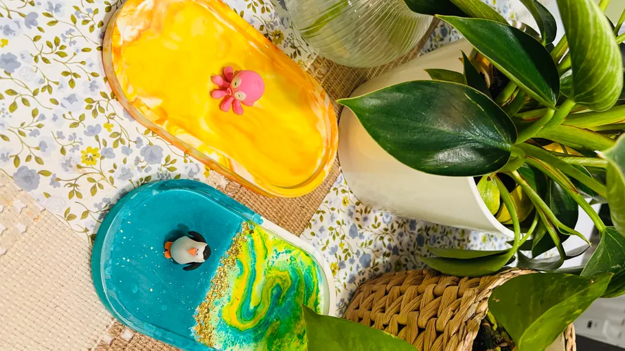 Two colorful trays with mini ocean and octopus.