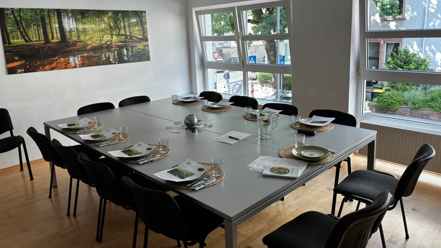 Set dining table with chairs and windows.