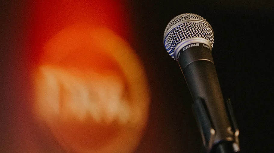 Microphone in focus with blurred background.