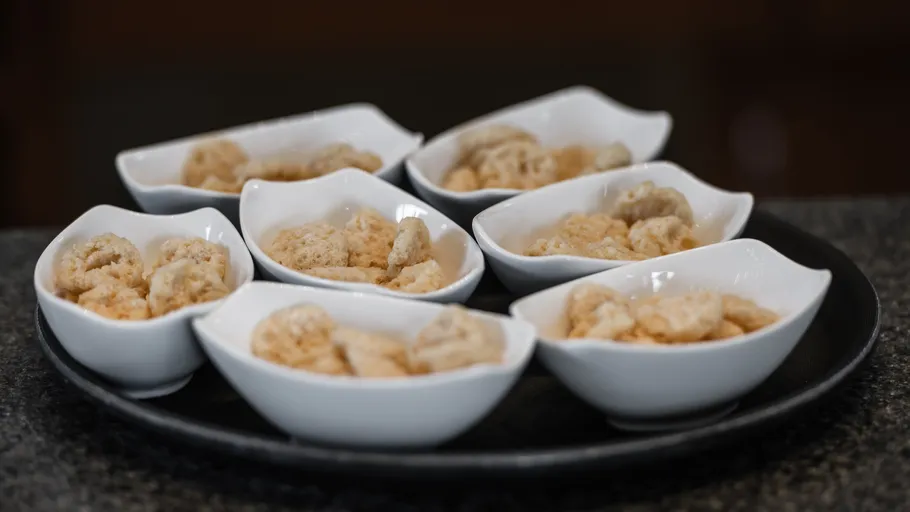 Bowls of food arranged on a tray.