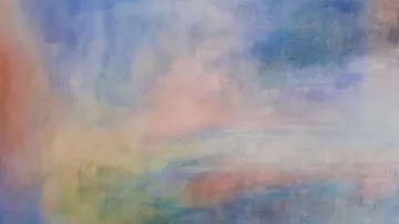 Abstrakte Regenbogenfarben mischen sich auf Leinwand.