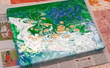 Abstract paint swirl on a canvas.
