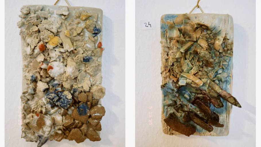 Two ceramic art pieces with textured surfaces.
