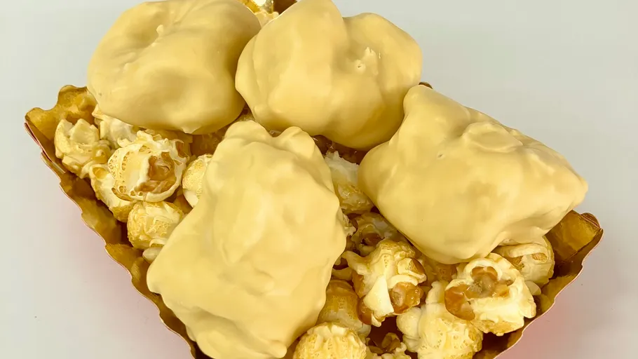 Popcorn and caramel clusters in a basket.