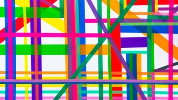 Colorful overlapping lines on white background.
