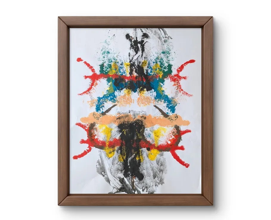 Abstract painting with colorful splashes, wooden frame.