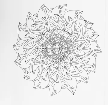 Intricate mandala design with swirling patterns.