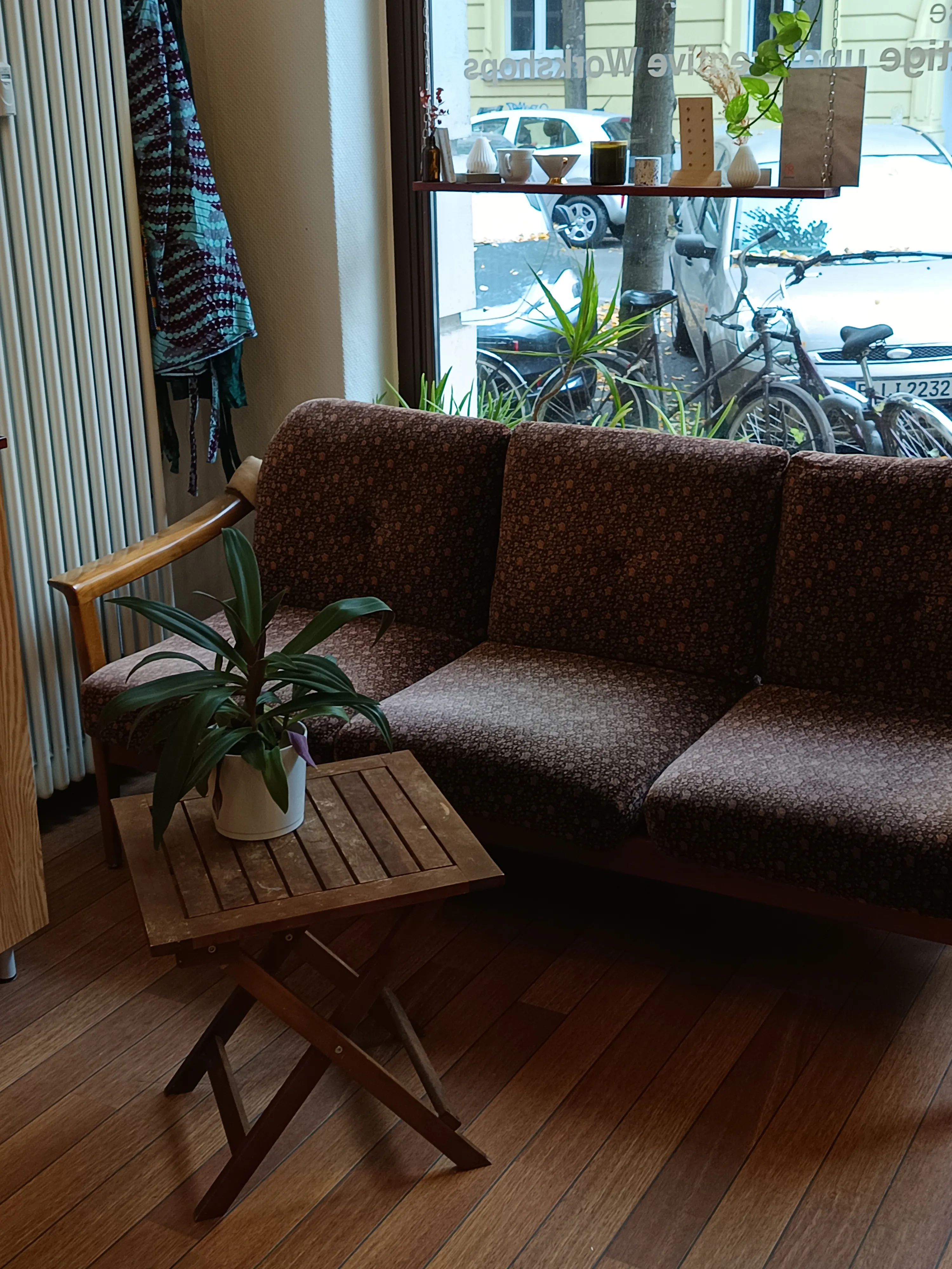 Vintage sofa and table in cozy cafe.