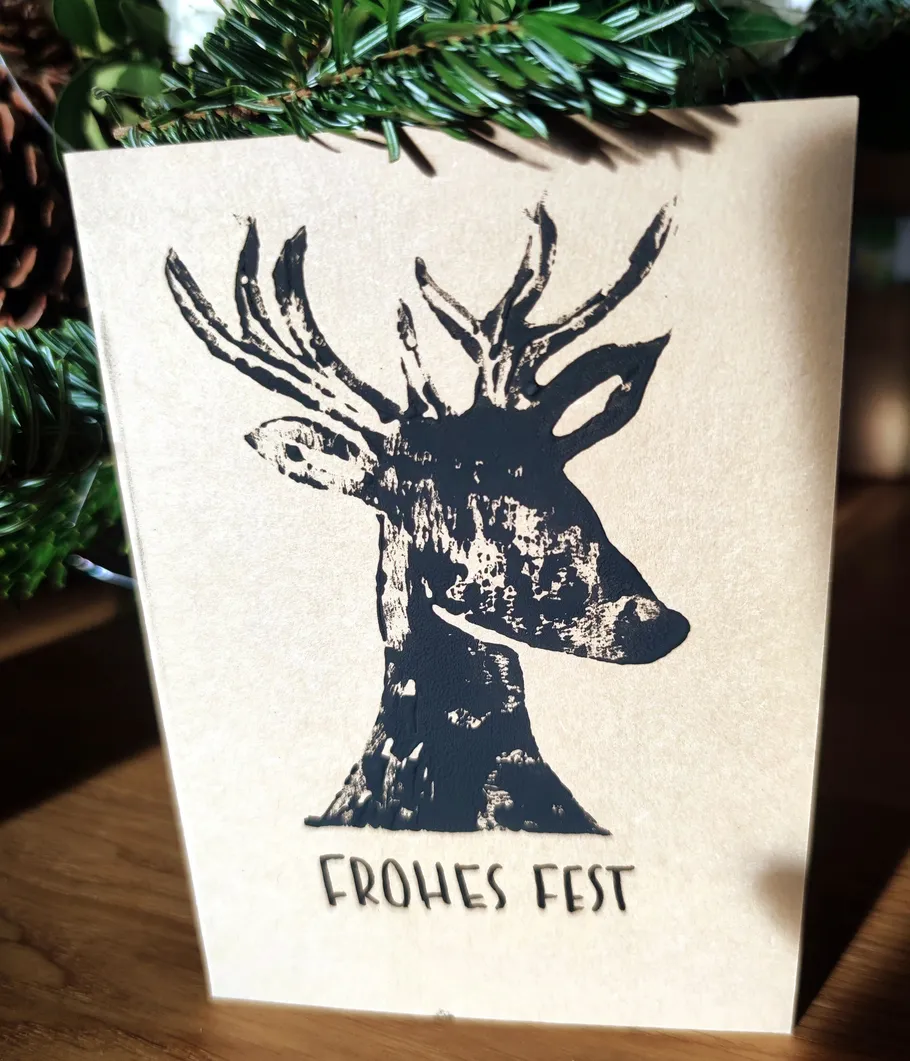 Greeting card with deer illustration and text.