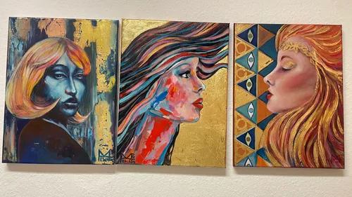 Three colorful portraits on white wall.