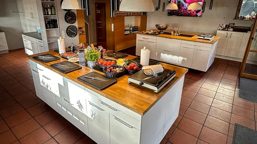 Kitchen island with food preparation items.