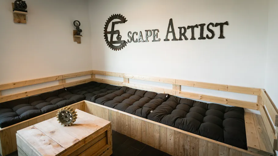 Wooden benches and table in a cozy room.