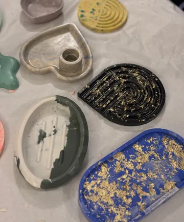 Colorful resin trays on a table.