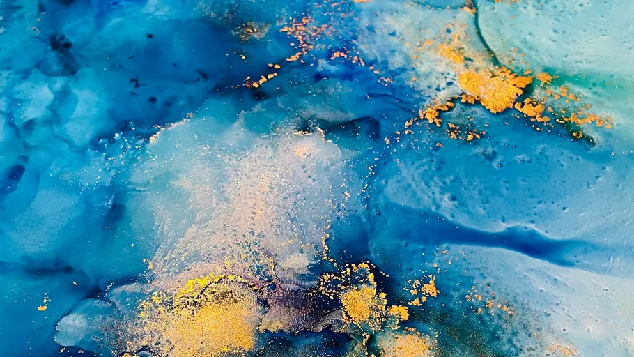 Abstract blue and gold painting texture.